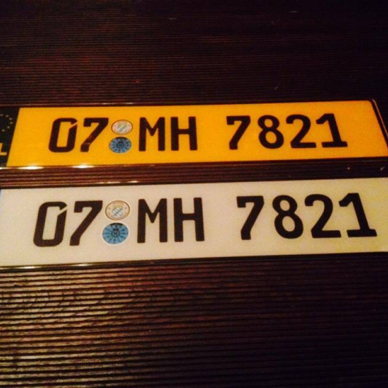 German Style plastic with badges, no county , no dash,  1 white 1 yellow 60mm text German Style plastic with badges, no county , no dash,  1 white 1 yellow 60mm text